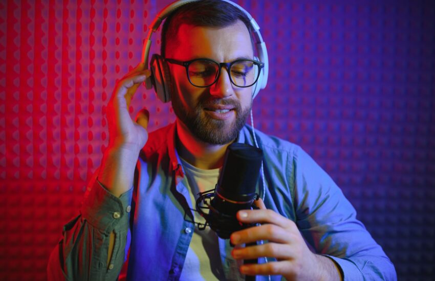 Man singing in a recording studio