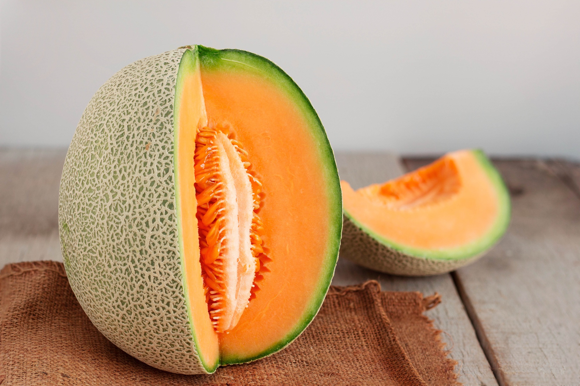 melon cut on wooden